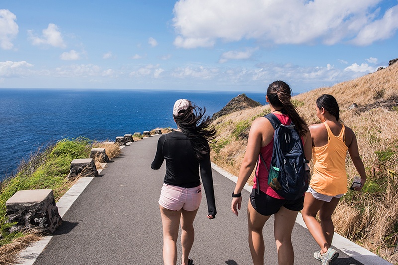 Girls hiking on a path on Oahu