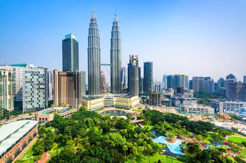 KLCC Park provides a green haven at the base of the Petronas Twin Towers.