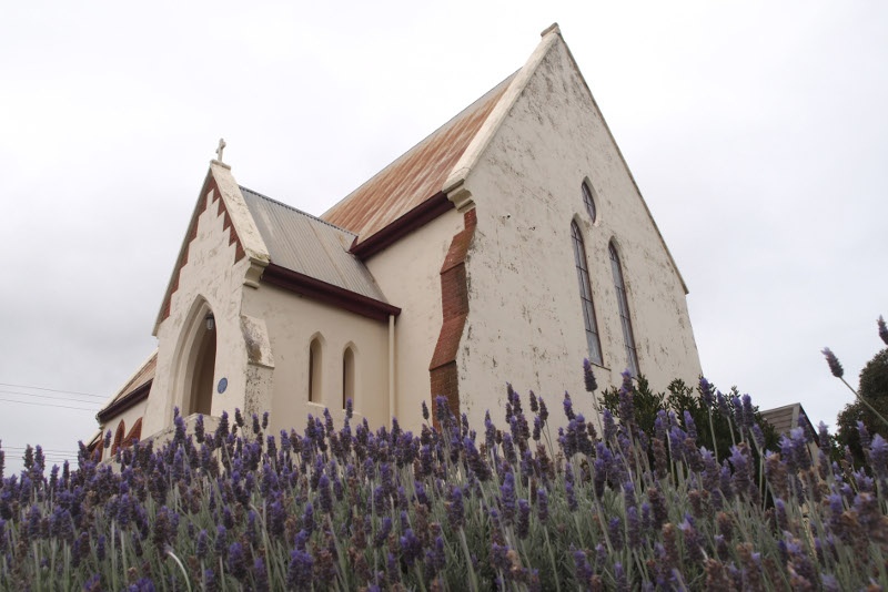 The Robe Church building standing on a field of lavander