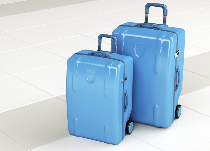Two blue suitcases