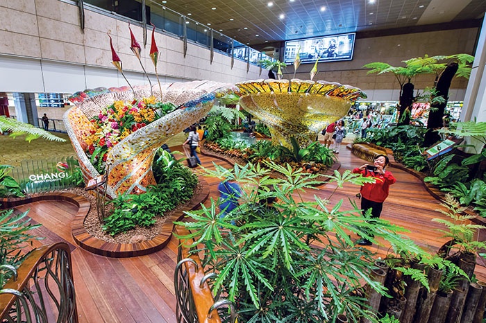 The colourful Enchanted Garden in Terminal 2. (Image: Changi Airport)