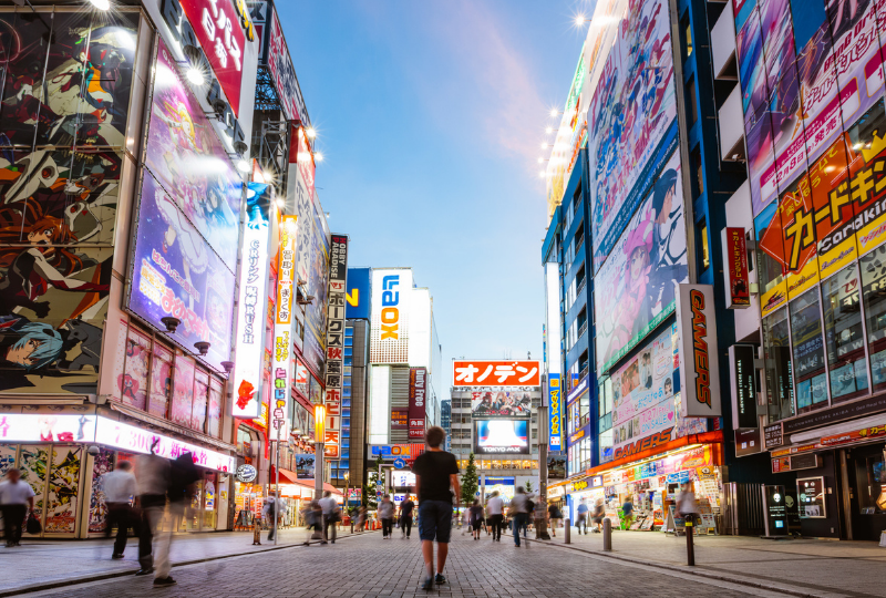 Teenager walking, Akihabara electric town, Tokyo, Japan