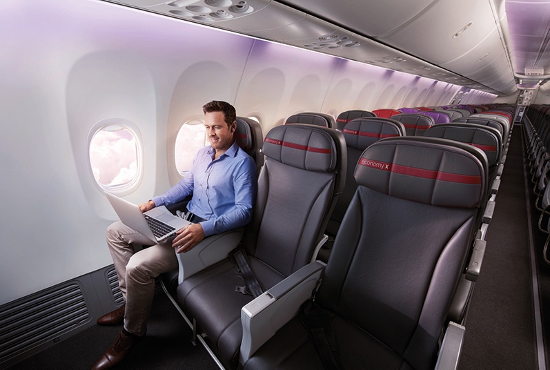 Male passenger in Virgin Australia Economy X seating on Boeing 737-800 plane