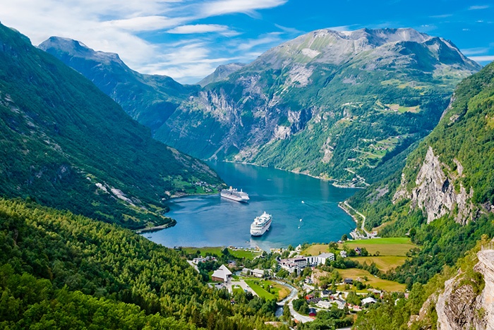 cruise ships docking in Geiranger Fjord, Norway