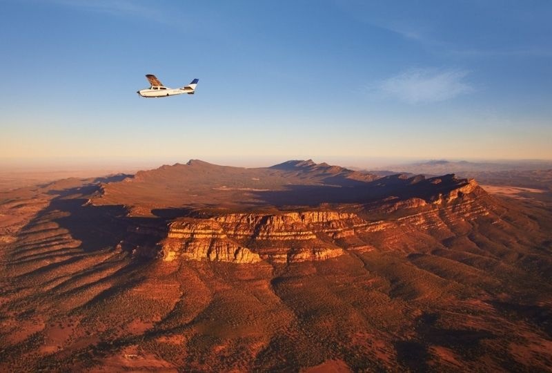 View of a plane flying over the Wilpena Pound