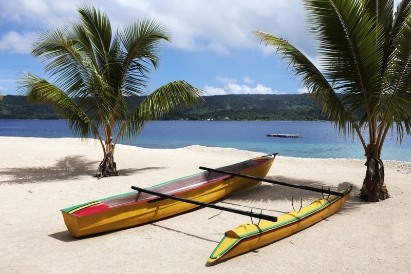 Canoe boat dock at the sand in a hideaway island