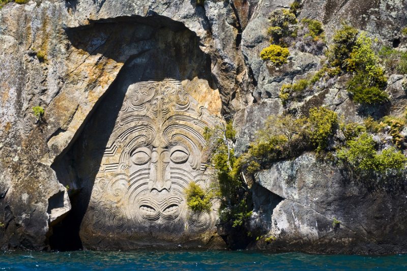 Maori rock carvings in Ngatoroirangi Mine Bay 