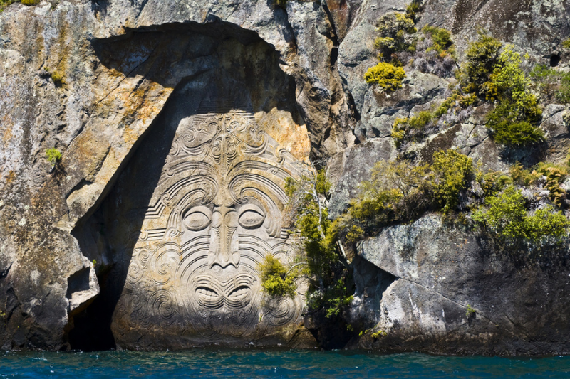 Maori rock carvings in Ngatoroirangi Mine Bay