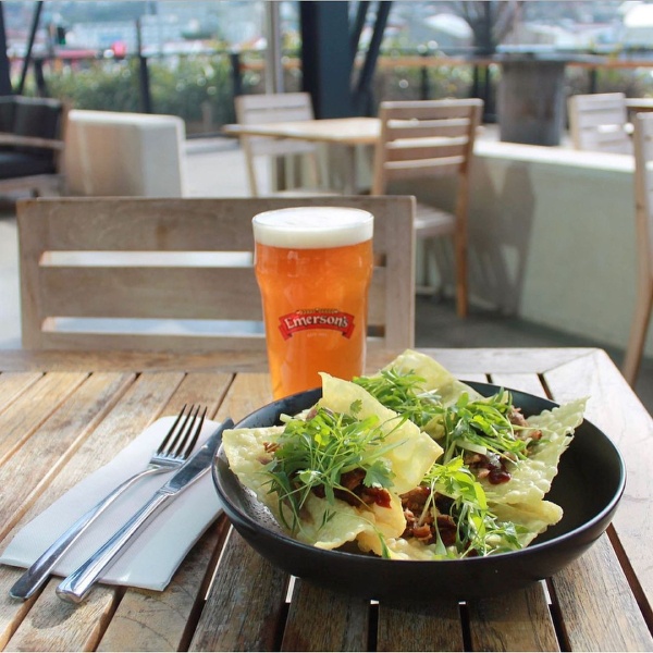 Enjoying a cold Emerson's beer with Peking Duck Wonton Crisps