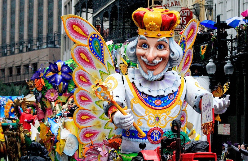 Large costume parade on St. Charles Avenue, New Orleans.