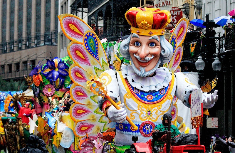 Large costume parade on St. Charles Avenue, New Orleans. 