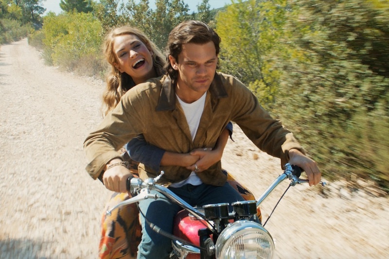 The two lead characters ride a motorbike in a publicity image from Mamma Mia 2: Here We Go Again