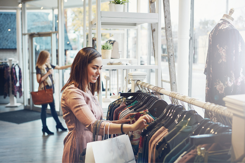 Young woman shopping at a clothing store