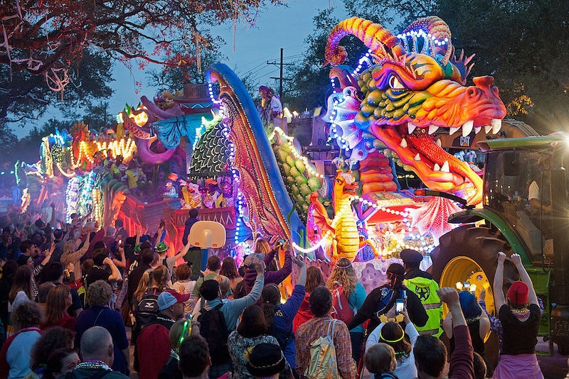 Crowds of people and the Orpheus Leviathan dragon in a parade