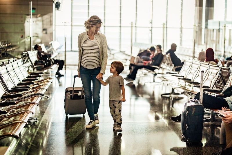 Lady and child walking in airport