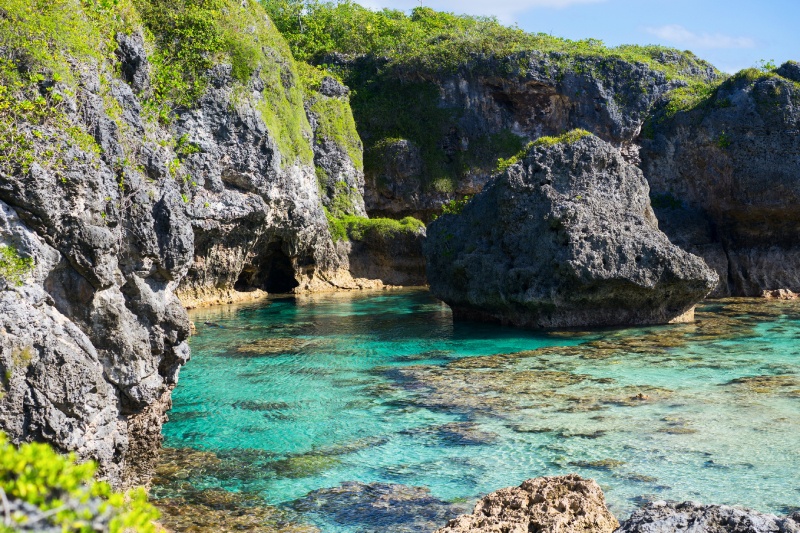 The crystal clear water of Limu Pools, a popular place for swimming and snorkelling, Niue.