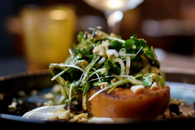 Pan roasted kumara paired with cashews and chilli &amp; lime salad at Vault 21