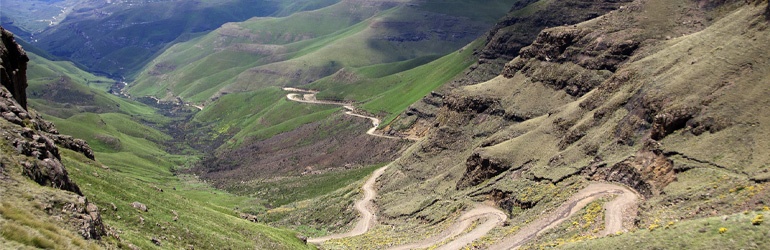 A road winding between mountains called the Sani Pass