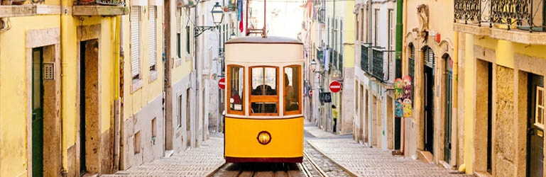 A tram going up a narrow street