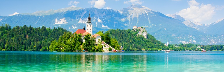 A castle in Slovenia overlooking stunning blue water