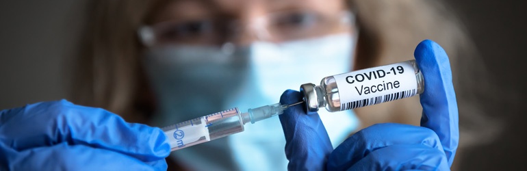 Nurse preparing a Covid-19 vaccination 